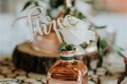 copper bottle white rose table number instagram footer image