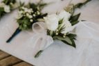 white rose buttonhole instagram footer image